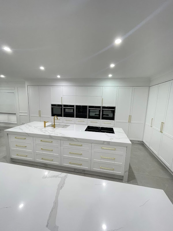 MA Kitchen & Wardrobe — custom Hamptons kitchen with marble island